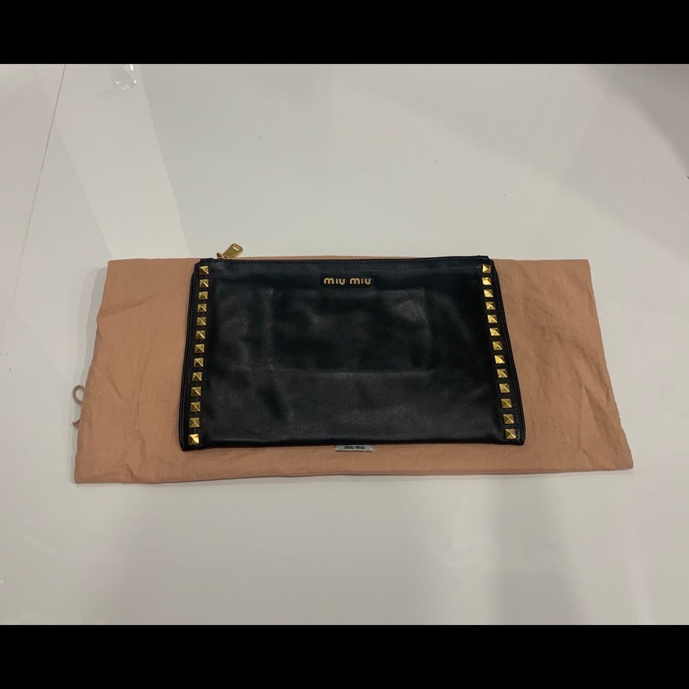 Authentic Miu Miu lightly used envelop clutch